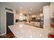 Modern kitchen offers white cabinets, quartz countertops, stainless steel appliances, and pantry at 15675 Myland Dr, Noblesville, IN 46062