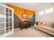 Comfortable, carpeted living area with modern accents and abundant natural light at 15675 Myland Dr, Noblesville, IN 46062