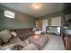 Relaxing living room with plush seating, an entertainment center, and a tranquil atmosphere at 15675 Myland Dr, Noblesville, IN 46062