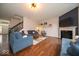 Comfortable living area with hardwood flooring, fireplace, and stylish decor at 15675 Myland Dr, Noblesville, IN 46062