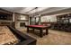 Spacious basement with a pool table, shuffle board, fireplace and full bar is perfect for entertaining guests at 1820 N 1100 E, Sheridan, IN 46069
