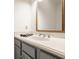 Bathroom vanity with gray cabinets, light countertop, mirror, and chrome faucet at 1820 N 1100 E, Sheridan, IN 46069