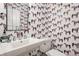 Powder room with horse patterned wallpaper, modern fixtures, and unique design at 1820 N 1100 E, Sheridan, IN 46069