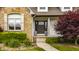 Inviting entryway with a decorative front door, stone accents, and manicured landscaping at 1820 N 1100 E, Sheridan, IN 46069