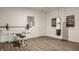 Simple in-home gym features vinyl flooring and workout equipment at 1820 N 1100 E, Sheridan, IN 46069