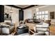 Spacious living room with modern furnishings, hardwood floors, and an abundance of natural light at 1820 N 1100 E, Sheridan, IN 46069