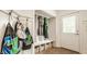 Mudroom with hooks, bench, storage cubbies, and access to the backyard at 1820 N 1100 E, Sheridan, IN 46069