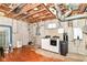 Unfinished basement featuring an exposed ceiling, washer and dryer, and utility equipment at 18967 Mill Grove Dr, Noblesville, IN 46062