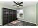 Well-lit bedroom with built-in shelving and a bright window at 18967 Mill Grove Dr, Noblesville, IN 46062
