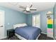 Cozy bedroom with a ceiling fan and window at 18967 Mill Grove Dr, Noblesville, IN 46062