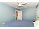 Comfortable bedroom featuring ceiling fan and ensuite access at 18967 Mill Grove Dr, Noblesville, IN 46062