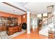Large office with hardwood floors, column, and lots of natural light at 18967 Mill Grove Dr, Noblesville, IN 46062