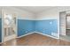 Unique bedroom showcasing two-tone walls and open doorway with a bathroom view at 20530 Victory Chapel Rd, Noblesville, IN 46060
