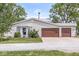 Charming single-story home with a two-car garage, bay window, and well-maintained landscaping at 20530 Victory Chapel Rd, Noblesville, IN 46060