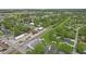 High angle of a charming community with homes, trees, and railroad tracks nearby at 30 N Depot St, New Palestine, IN 46163