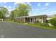 Brick home with a covered patio, perfect for outdoor entertaining and relaxation at 30 N Depot St, New Palestine, IN 46163