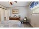 Comfortable bedroom with bright window, lots of space and warm accents at 30 N Depot St, New Palestine, IN 46163