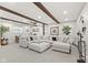 Bright living room with beam ceilings, large sectional sofa, and cozy decor at 30 N Depot St, New Palestine, IN 46163