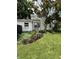 The home has a lush backyard with mature plantings at 303 Walnut St, Greenfield, IN 46140