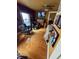 A view of a cozy bedroom with hardwood flooring at 303 Walnut St, Greenfield, IN 46140