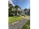 Lovely home with a welcoming front porch and beautifully landscaped surroundings at 303 Walnut St, Greenfield, IN 46140
