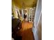View of hallway with hardwood floors at 303 Walnut St, Greenfield, IN 46140