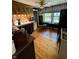 Cozy kitchen with light wood floors, unique sink, and a table near the window at 303 Walnut St, Greenfield, IN 46140