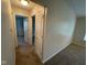 Hallway showing access to other rooms and carpeted flooring at 356 Seabreeze Cir, Avon, IN 46123