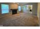 Spacious living room featuring a fireplace and plenty of natural light at 356 Seabreeze Cir, Avon, IN 46123