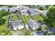 Aerial shot showcasing the property's fenced yard and detached garages at 3636 Crescent Ave, Indianapolis, IN 46208