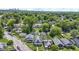This is a great view of homes in a lush residential neighborhood, with the city skyline in the distance at 3636 Crescent Ave, Indianapolis, IN 46208