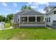 Charming home with inviting covered porch, and well-kept lawn at 3636 Crescent Ave, Indianapolis, IN 46208