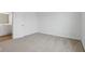 Neutral carpeted bedroom showing the en suite bath at 3931 Wren Dr, Brownsburg, IN 46112