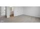 Neutral carpeted bedroom showing the en suite bath at 3931 Wren Dr, Brownsburg, IN 46112