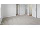 Neutral carpeted bedroom with base molding and white doors at 3931 Wren Dr, Brownsburg, IN 46112