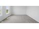 Bedroom featuring plush carpet and natural light from the two windows at 3931 Wren Dr, Brownsburg, IN 46112