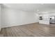 Spacious living room and kitchen area with modern finishes and stainless steel appliances at 3931 Wren Dr, Brownsburg, IN 46112
