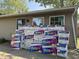 Exterior shot of a home with stacks of insulation materials nearby at 409 Parkway St, Whiteland, IN 46184
