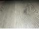 Close-up of the light wood-look floor at 409 Parkway St, Whiteland, IN 46184