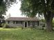 Charming single-story home featuring a cozy layout and a spacious front yard, perfect for Gathering gatherings at 409 Parkway St, Whiteland, IN 46184