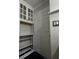 Hallway with built in shelves and cabinets at 409 Parkway St, Whiteland, IN 46184