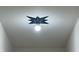 Stylish ceiling light fixture adds a touch of modern elegance to the hallway creating a well lit space at 409 Parkway St, Whiteland, IN 46184