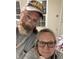 A selfie of two happy people standing in front of drywall at 409 Parkway St, Whiteland, IN 46184