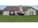 Spacious backyard patio with outdoor dining set, ideal for relaxing and entertaining guests at 4920 E Daisy Ln, Mooresville, IN 46158