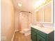 Bright bathroom with shower-tub combination, single sink vanity, and modern fixtures at 5 E Jefferson St, Maxwell, IN 46154