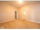Bedroom featuring carpeted floors, fresh paint, and a walk in closet at 5 E Jefferson St, Maxwell, IN 46154