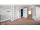 Carpeted bedroom with a closet and natural lighting at 5 E Jefferson St, Maxwell, IN 46154