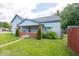 Charming two-story home with a covered front porch and a well-maintained lawn, perfect for suburban living at 5 E Jefferson St, Maxwell, IN 46154