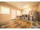 Functional laundry room with side by side washer and dryer and an abundance of storage at 5 E Jefferson St, Maxwell, IN 46154