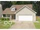 Charming single-Gathering home with a well-manicured lawn and a two-car attached garage at 5240 Ochs Ave, Indianapolis, IN 46254